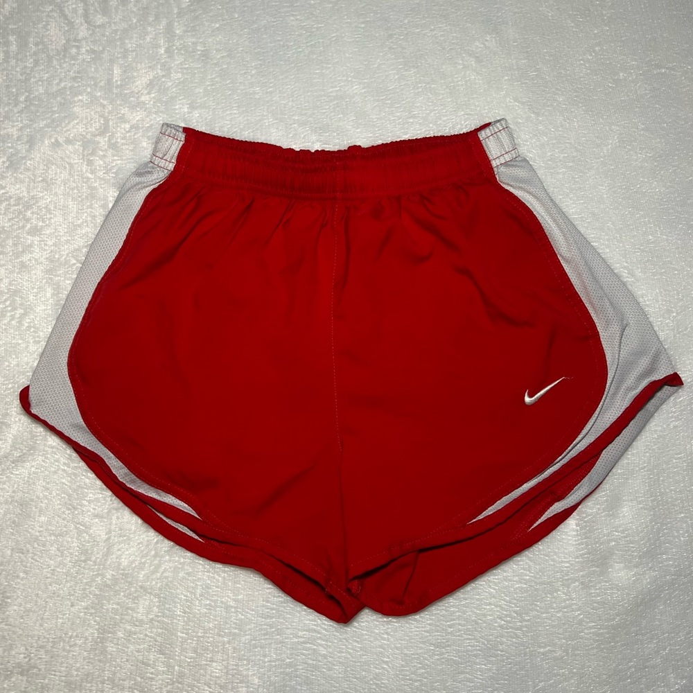 NIKE red and white running shorts